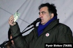 Mikheil Saakashvili spoke to his supporters as they camped out outside parliament in Kyiv on December 6.