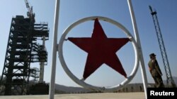 A soldier stands guard at the site of North Korea's expected rocket launch.