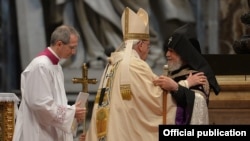 The Vatican - Pope Francis greets Catholicos Garegin II during a Vatican Mass dedicated to the 100th anniversary of the Armenian genocide in Ottoman Turkey, 12Apr2015.