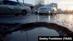 Разбитые дороги в Омске