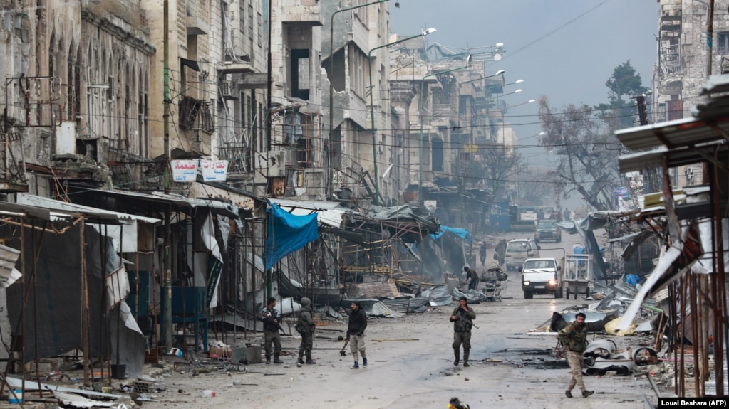 جنگجویان طرفدار بشار اسد در شهری در استان ادلب سوریه، ژانویه ۲۰۲۰