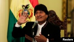 Bolivia -- President of Bolivia Evo Morales speaks during a news conference at the presidential palace in La Paz. Bolivia, October 13, 2014. 