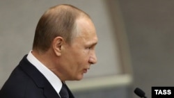 Russian President Vladimir Putin speaks at the final plenary session of the current State Duma, Moscow, on June 22.