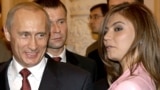 President Vladimir Putin and gymnast Alina Kabayeva at a Kremlin event in 2004