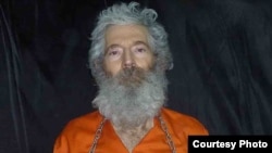 A photograph of Robert Levinson received by his family in April 2011.