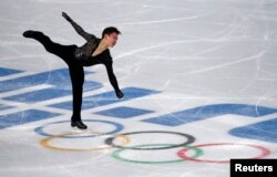 Денис Тен Сочи олимпиадасында. 13 ақпан 2014 жыл.