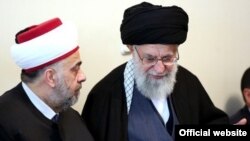 علی خامنه ای در دیدار با وزیر اوقاف سوریه.