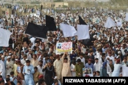 Thousands of supporters and activists of the PTM wait for their leader Manzoor Pashteen during a protest rally in Karachi on May 13.