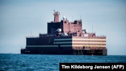 The world's first floating nuclear power plant, Russia's Academy Lomonosov, travels on the way to Murmansk.