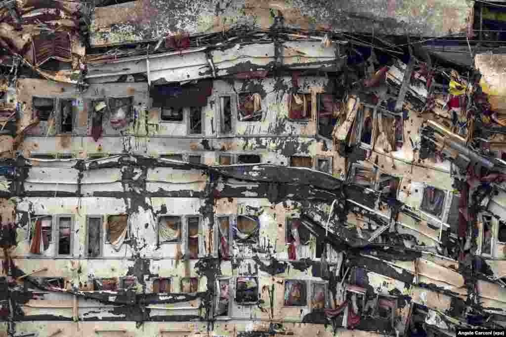 The shipwrecked cruise ship Costa Concordia is returned to an upright position after a salvage operation near Italy's Giglio Island on September 17. The ship had capsized in January 2012, killing dozens of people.