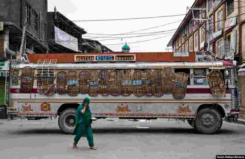 A police bus blocks a street in Kashmir. Leaders in Kashmir have warned of a violent response to the stripping of its autonomy in a region where militants have been fighting against Indian rule for nearly 30 years, a conflict that has killed more than 50,000 people.&nbsp;