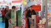 People in Moscow buy household appliances to take advantage of suddenly low prices on December 17.