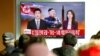 Люди дивляться новини про запуск ракети Північною Корею. Південна Корея, Сеул, 29 листопада 2017 року