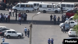 Armenia - Police vehicles block a road leading a police station in Yerevan seized by armed opposition activists, 17Jul2016.