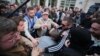 Poroshenko, Zelenskiy Supporters Briefly Clash Outside Challenger’s Kyiv Headquarters