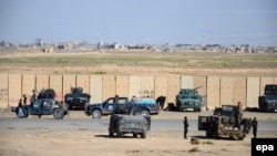 قوات عراقية تتخذ مواقعها قرب مدينة تكريت