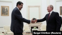 Nicolas Maduro and Russian President Vladimir Putin meet at the Kremlin in 2019. 