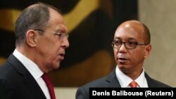Russian Foreign Minister Sergei Lavrov (left) and U.S. Ambassador Robert Wood attend a session of the Conference on Disarmament at the United Nations in Geneva in March 2019.