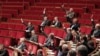 France -- Members of the French National Assembly vote an amendment at the French National Assembly in Paris, 22Dec2011 