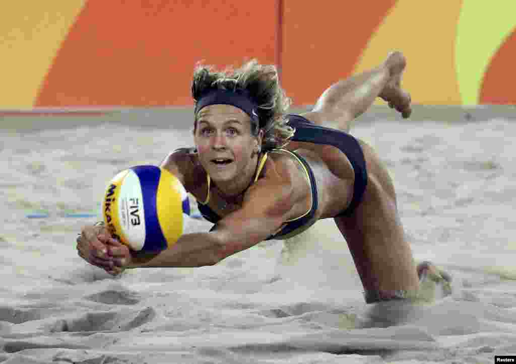 Laura Ludwig of Germany competes in the women&#39;s beach-volleyball final against Brazil, which Germany won.