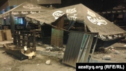 Some of the damage outside the Almaty shopping center where violence erupted on August 31 after a Kairat Nurtas concert was called off.