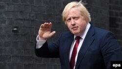 New U.K. Foreign Secretary Boris Johnson arrives at No. 10 Downing Street after being summoned by new British Prime Minister Theresa May in London on July 13.