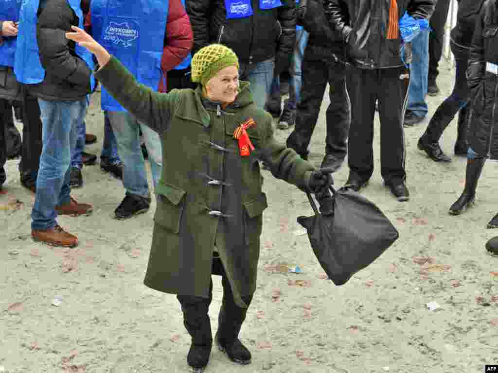 A supporter of Viktor Yanukovych celebrates the victory of the former Orange Revolution villain in Ukraine's presidential election on February 10. Photo by Sergei Supinski for AFP