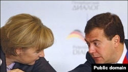 Angela Merkel și Dimitri Medvedev