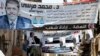 Banners of Egypt's Muslim Brotherhood candidate, Muhammad Morsi (front) and his rival, former leader Hosni Mubarak's last prime minister, Ahmed Shafiq, decorate a street in Cairo.
