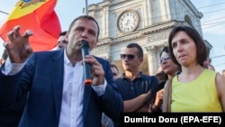 Andrei Nastase (left) and Maia Sandu appear at the protests in Chisinau on July 2.