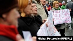 Demonstrators rally in front of the federal parliament building in Sarajevo on February 12, as protests over unemployment, corruption, and political paralysis enter their second week.