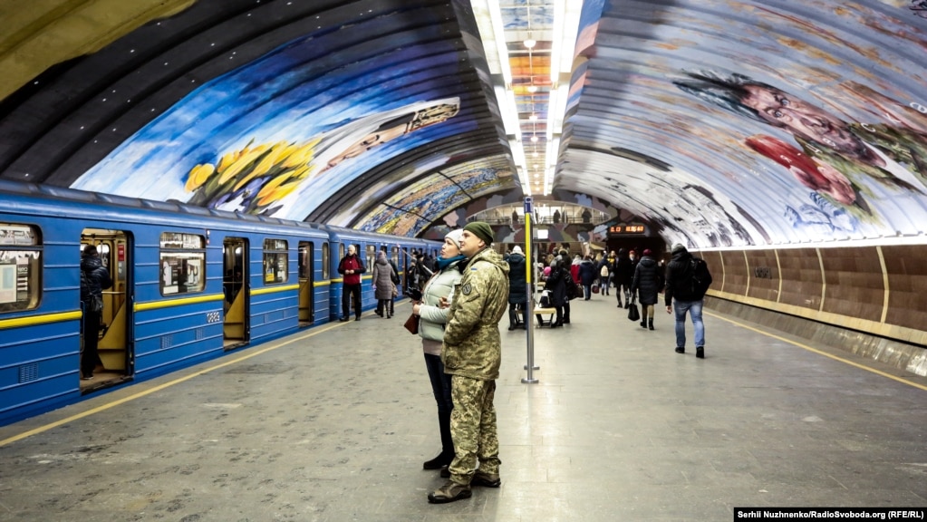 A soldier and his wife take a moment to check out the art. A state official said the project, which cost 3.65 million hryvnia (about $132,000), was aimed at putting Kyiv on the art map. &quot;Today street art is [a reason] people come to New York or London; we would like Kyiv to be such a tourist city as well.&quot;&nbsp; &nbsp;