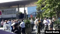 Protesters near Iran's central bank demanding resignation of the bank's governor. June 14, 2020