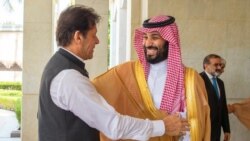 FILE: Pakistani Prime Minister Imran Khan is welcomed by Saudi Arabia's Crown Prince Mohammed bin Salman in Jeddah in September 2019.