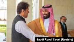 Pakistani Prime Minister Imran Khan (left) is welcomed by Saudi Crown Prince Muhammad bin Salman in Jeddah in September 2019.
