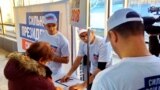 Russia -- The point of collecting signatures for presidential candidate Putin