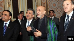 Turkish Prime Minister Recep Tayyip Erdogan (right) and President Abdullah Gul (second from left) with the Pakistani and Afghan presidents, Asif Ali Zardari (left) and Hamid Karzai in Istanbul.