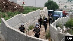 Policia shqiptare në Lazarat gjatë aksionit në muajin qershor të vitit 2014