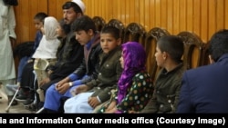 Дети, пострадавшие от мин, участвуют в конференции в Кабуле в Международной день действий против мин, Кабул, 4 апреля 2019 года
