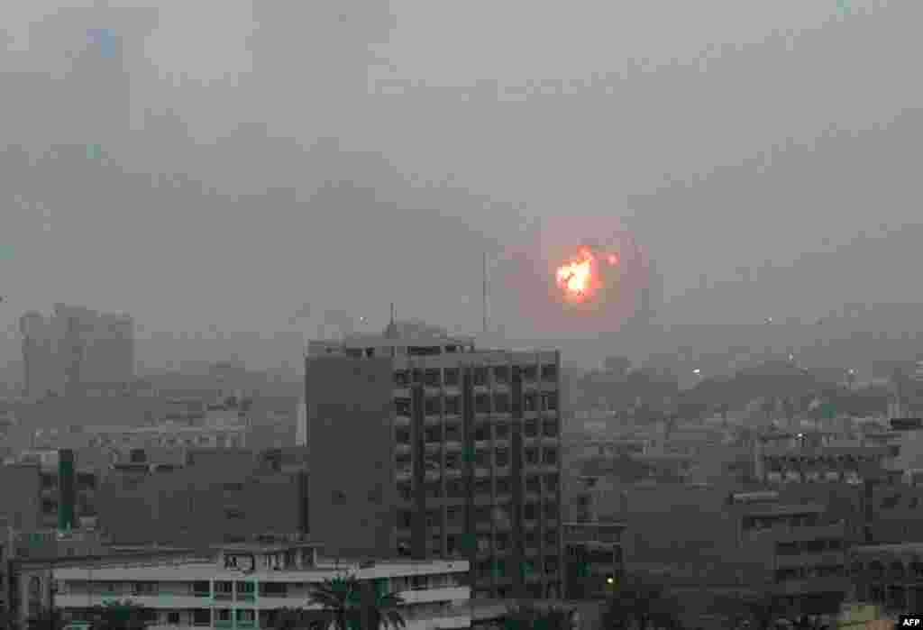 An explosion is seen in Baghdad on March 20 during the early massive show of military force known as &quot;shock and awe.&quot; 