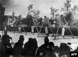 A picture released by the Armenian Genocide Museum-Institute purportedly shows Armenians hung by Ottoman forces in Constantinople in June 1915.