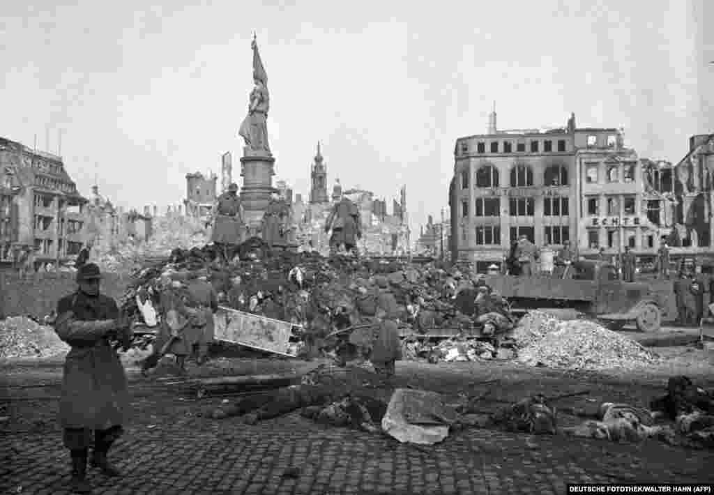 A pile of bodies before they were publicly cremated. Some 25,000 people were killed during the bomb attacks on Dresden, many incinerated in a firestorm so powerful people were literally sucked down streets and into the inferno. &nbsp;