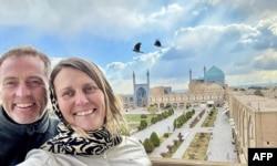 A handout photograph released in August 2025 by the family of Craig and Lindsay Foreman shows the couple at Naqsh-e Jahan Square, or Shah Square, with the Shah Mosque in the background, in Isfahan, Iran, at an undated time.
