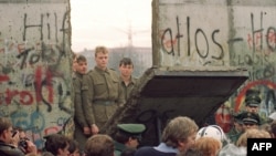 The Berlin Wall came down almost one year before reunification.