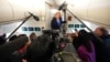 Američki predsjednik Donald Trump razgovara s novinarima u avionu Air Force One 2. augusta.