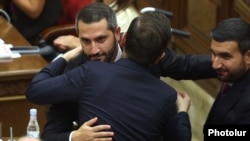 Armenia - Ruben Rubinian is congratulated by fellow pro-government deputies on becoming the new Armenian parliament speaker, Yerevan, August 2, 2026. 