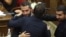 Armenia - Ruben Rubinian is congratulated by fellow pro-government deputies on becoming the new Armenian parliament speaker, Yerevan, August 2, 2026. 