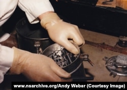 A container filled with rods of highly enriched uranium inside the Ulba Metallurgical Plant
