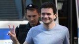 RUSSIA -- Russian opposition figure and excluded election candidate Ilya Yashin is escorted to a court hearing in Moscow, August 29, 2019