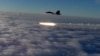 RUSSIA -- An Su-30 fighter jet of the Russian air force launches a missile during maneuvers in southern Russia, September 27, 2018